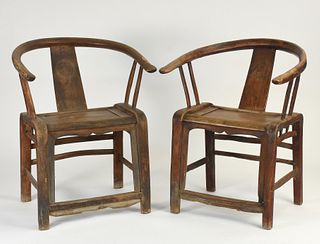 Pair of early horseshoe design Chinese armchairs