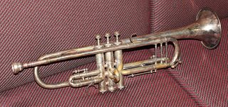 Silvered trumpet with mouth piece, Vincent Bach