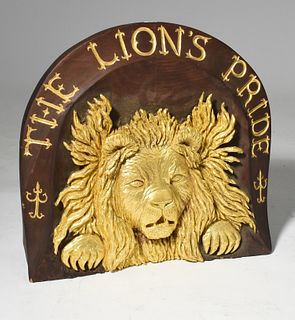 Carved and gilt wooden sign,"The Lions Pride"