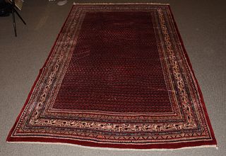 Roomsize Oriental rug with maroon field