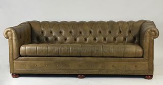 Tufted leather sleeper sofa by Hancock and Moore