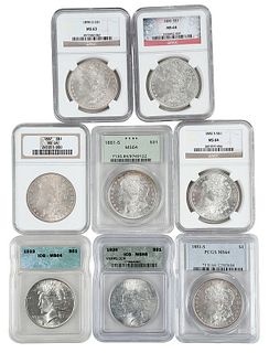 Group of Eight Graded Silver Dollars 