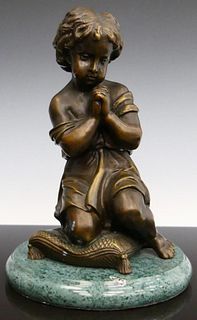 BRONZE FIGURINE OF A YOUNG GIRL PRAYING