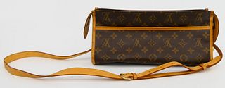 LOUIS VUITTON MONOGRAMED LEATHER BAG WITH STRAP