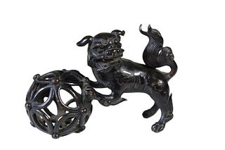 Chinese Bronze Foo Dog on Reticulated Ball