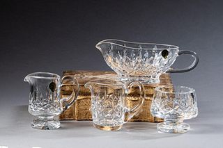 Four Waterford Crystal Pieces.