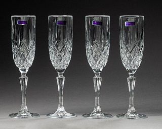 Four Waterford Marquis Flutes.
