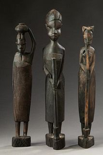 Three Carved African Figures.