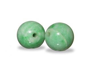 Two Chinese Jadeite Beads, 19th Century