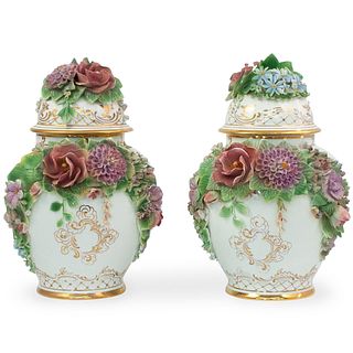 Pair of Floral Encrusted Porcelain Covered Urns