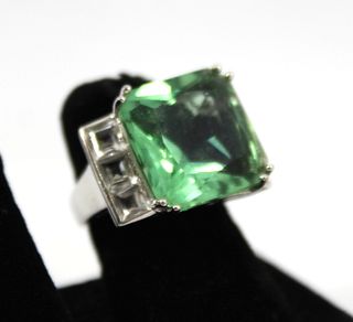 Silver, Green Stone, and White Topaz Ring