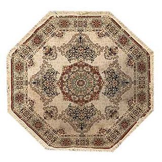 Tapete. Persia. Siglo XX. Estilo Mashad. Diseño octogonal. Decorado con medallón central. 179 x 179 cm.