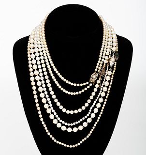 FIVE STRANDS OF CULTURED PEARL NECKLACES, RUBY