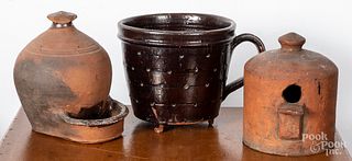 Four pieces of Pennsylvania redware, 19th c.