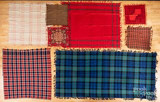 Group of plaid blankets and throws