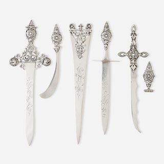 George W. Shiebler & Co., collection of six letter openers and one seal