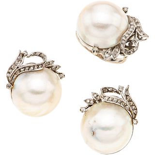 RING AND EARRINGS SET WITH HALF PEARLS AND DIAMONDS. PALLADIUM SILVER