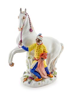 A Meissen Porcelain Figural Group Height 16 1/2 inches.