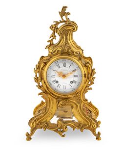 A Lous XV Style Gilt Bronze Mantel Clock Height 15 inches.