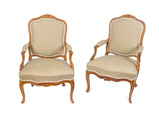 A Pair of Louis XV Style Oak Fauteuils Height 37 inches.