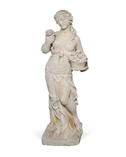 A Cast Stone Figure of a Young Woman Holding a Basket of Flowers