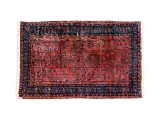 A Sarouk Wool Rug 10 feet 7 inches x 13 feet 6 inches.