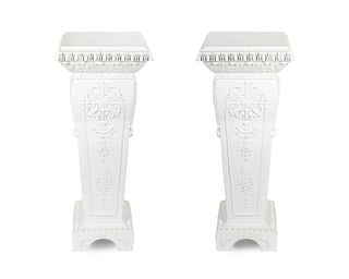A Pair of White Painted Carved Wood Pedestals Height 43 inches.