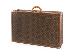 A Louis Vuitton Monogram Canvas Hardside Suitcase.
