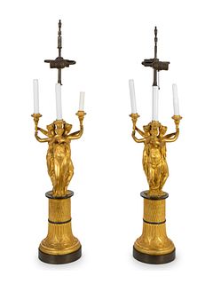 A Pair of Gilt Bronze Candelabra After Thomire Height of tallest overall 36 inches; each base 21 inches.