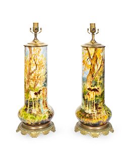 A Pair of Charles Volkmar (American, 1841-1914) Bronze Mounted Ceramic Lamps Height overall 23 inches.