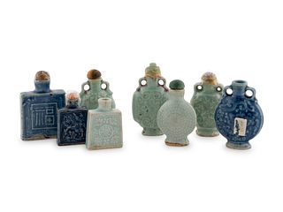A Group of Eight Porcelain Snuff Bottles Height of largest 3 1/8 inches.