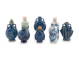 A Group of Eight Chinese Blue and White Porcelain Snuff Bottles Height of largest 3 3/4 inches.