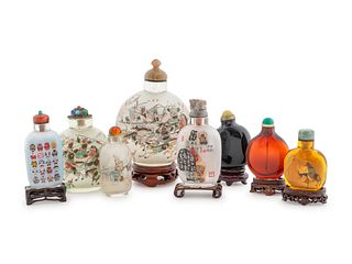 A Group of Eight Chinese Glass Snuff Bottles Height of tallest 4 3/4 inches.