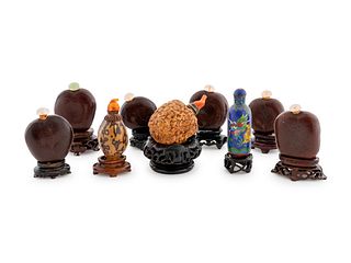A Group of Nine Chinese Snuff Bottles Height of tallest 2 1/4 inches.