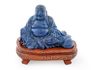 A Chinese Carved Lapis Figure of a Laughing Buddha Height 3 1/2 x length 5 x depth 3 inches.