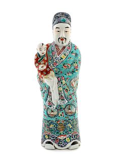 A Chinese Famille Rose Figure of a Scholar and a Child Height 18 inches.