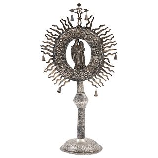 Sentinel. Mexico, 18th century. Low-grade silver engraved with the image of the Virgin and Child. 20.5" (52.2 cm) tall