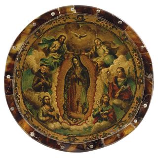 Nun's Medallion with Virgin of Guadalupe and Saints. Mexico, 18th century. Oil on copper foil with tortoiseshell frame.
