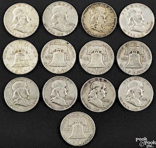 Thirteen Franklin half dollars, to include three 1950, three 1951, two 1952, a 1953, two 1953 D
