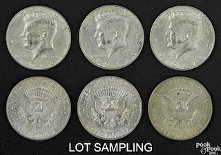 Ninety-nine silver clad Kennedy half dollars, 40% silver, average circulated.