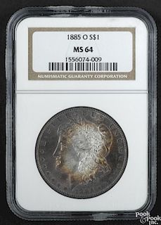 Morgan silver dollar, 1885 O, NGC MS-64 with bull's-eye toning.