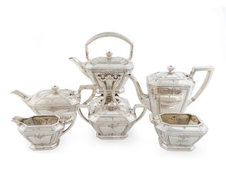 An American Silver Six-Piece Tea and Coffee Service 
Height of kettle on stand 10 7/8 x length 9 x width 5 inches.