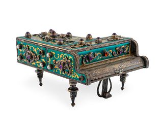 A Reuge Piano-Form Music Box
Height 4 x width 6 x depth 6 7/8 inches.