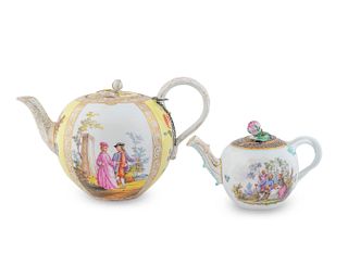 Two German Porcelain Teapots
Heights 4 /4 and 6 inches; lengths 6 1/4 and 9 1/2 inches.