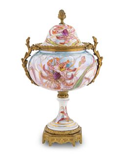 A Sevres Style Gilt-Bronze-Mounted Porcelain Vase and Cover 
Height 14 1/2 x width over handles 9 1/2 inches.
