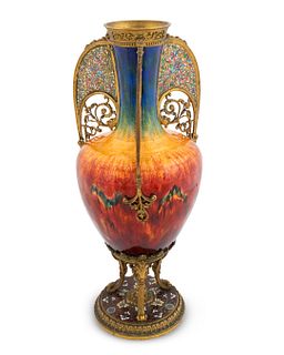 A Limoges Gilt-Bronze, Plique a Jour, Champleve and Translucent Enamel Vase
Height 14 1/2 x diameter 7 1/2 inches.