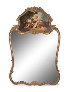 A Louis XV Style Giltwood Trumeau
Height 62 x width 40 1/2 inches.