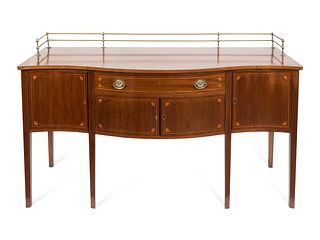 A George III Style Satinwood Inlaid Serpentine Sideboard
Height 38 x width 72 x depth 23 1/2 inches. 