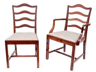 A Set of Fourteen George III Style Mahogany Ladder Back Dining Chairs
Height 36 3/4 inches.