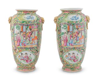 A Pair of Chinese Famille Rose Porcelain Vases
Height  9 1/2 x diameter 4 1/2 inches.